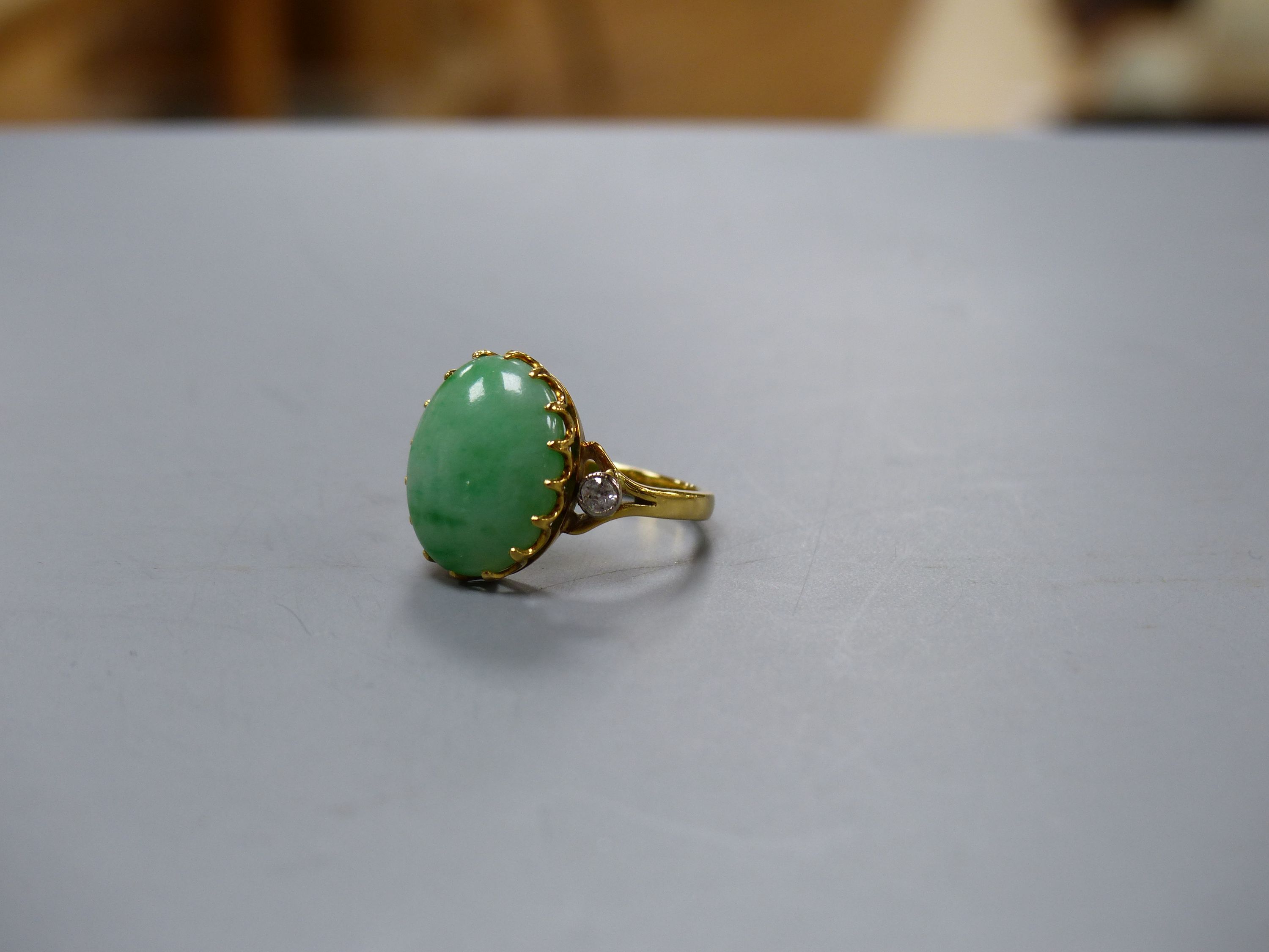 A jade and diamond dress ring, 18ct yellow gold setting